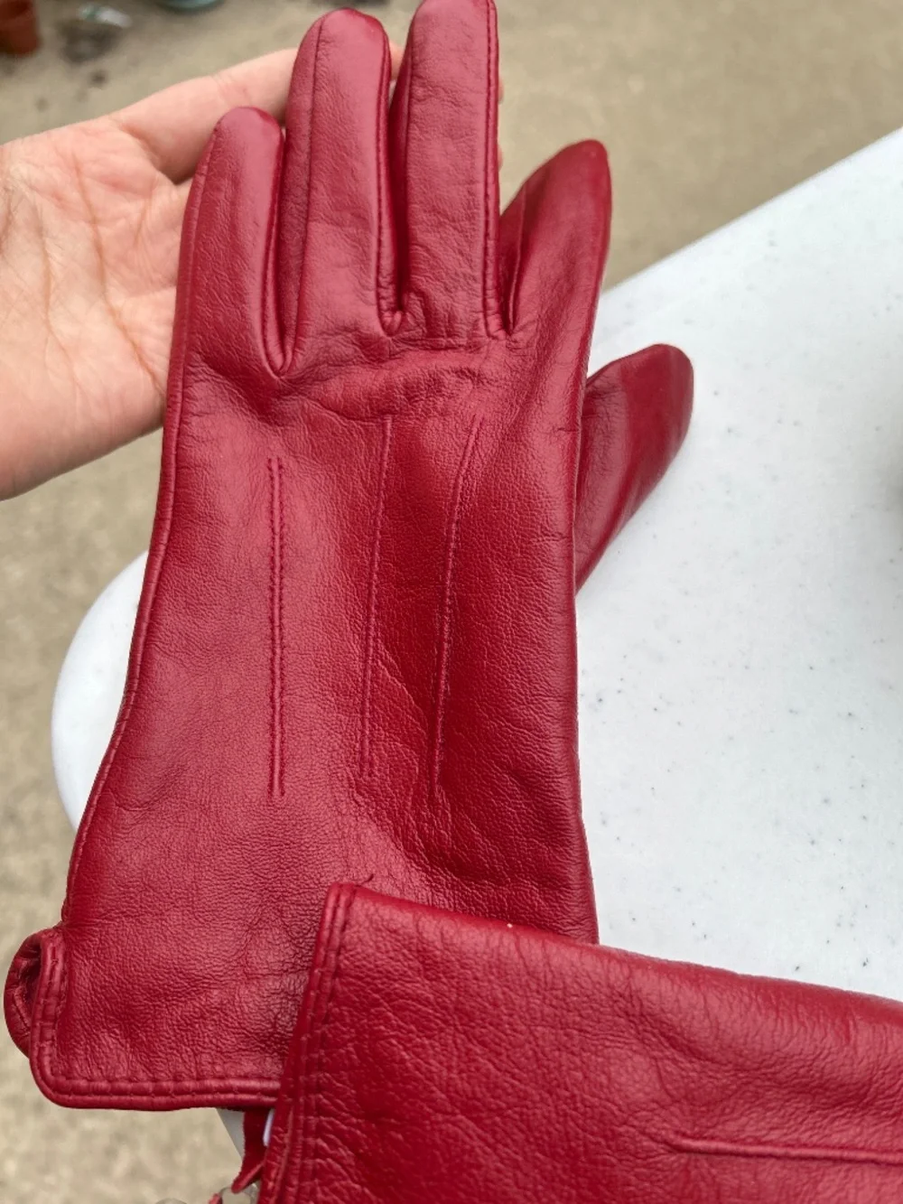 Red leather gloves